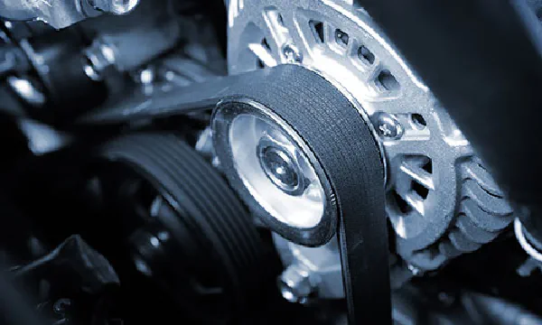 Alternator close up with belt.