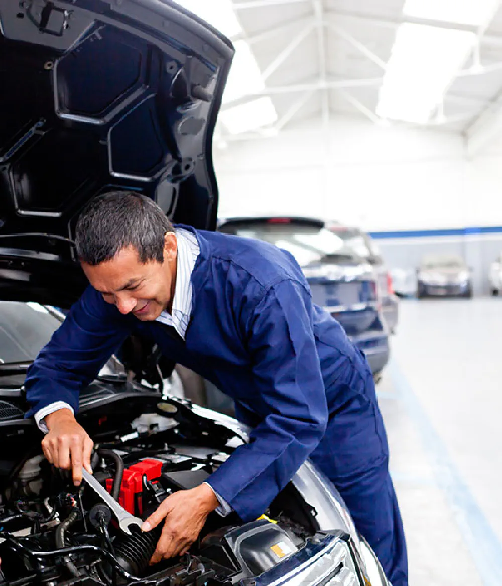 Mechanic working on car